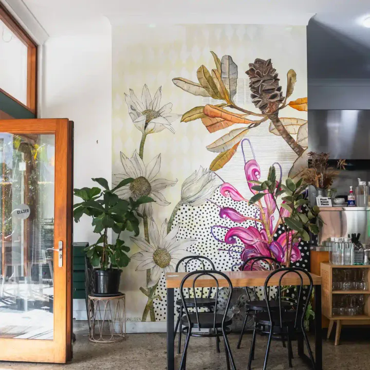 interior of vega cafe with wall art mural